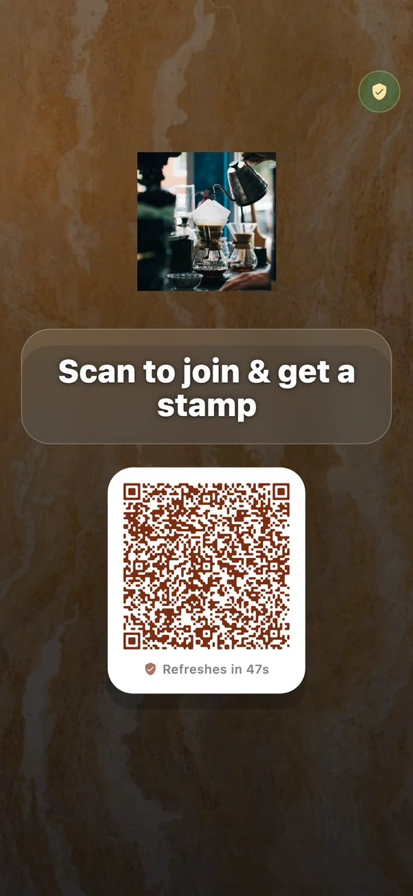 A FaveCard kiosk running on an iPhone, showing the business logo, Scan to join and get a stamp, and a QR code