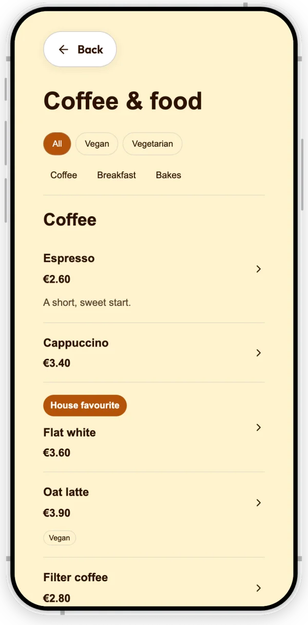 The Menu section of the example coffee shop's page: a Coffee section with Espresso, Cappuccino, Flat white marked House favourite, and Oat latte tagged Vegan, each with its price