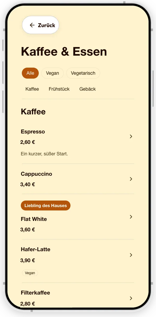 Die Speisekarte eines Beispiel-Cafés: Kaffeespezialitäten mit Preisen, ein Vegan-Hinweis und eine Markierung als Lieblingsgetränk des Hauses.