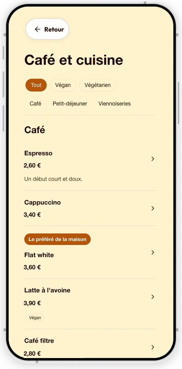 La rubrique Menu d’un café fictif : des cafés avec leurs prix, une mention Vegan et un badge « coup de cœur de la maison ».