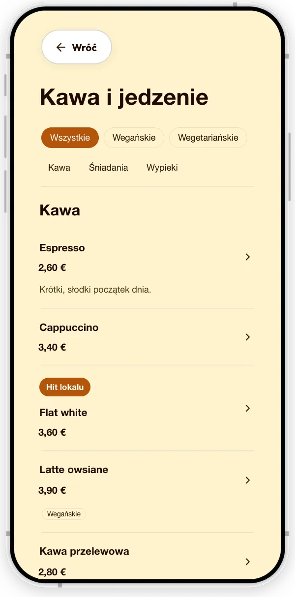 Sekcja Menu przykładowej kawiarni: kawy z cenami, oznaczenie wegańskie i wyróżnienie „specjalność lokalu”.