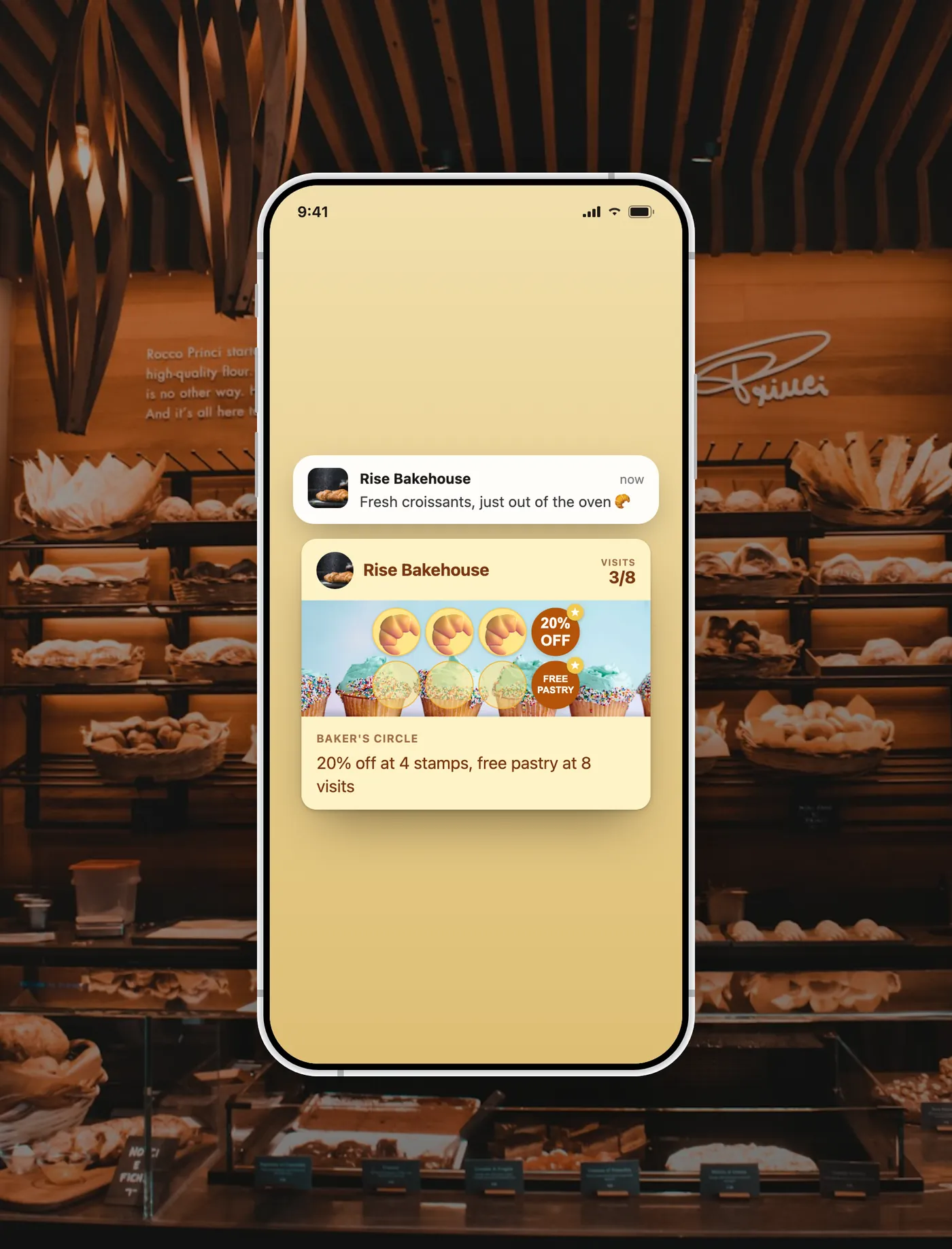 Carte de fidélité Rise Bakehouse dans le Wallet avec un message du commerce sur l’écran de verrouillage.